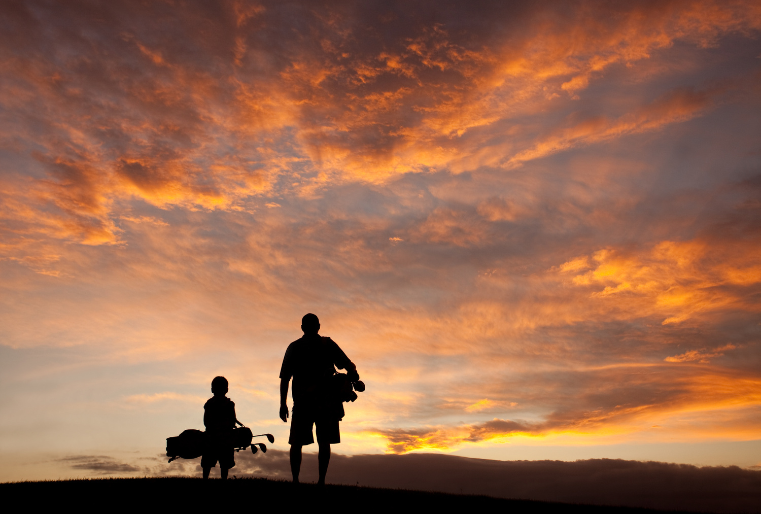 Father and Son Golf Silhouette