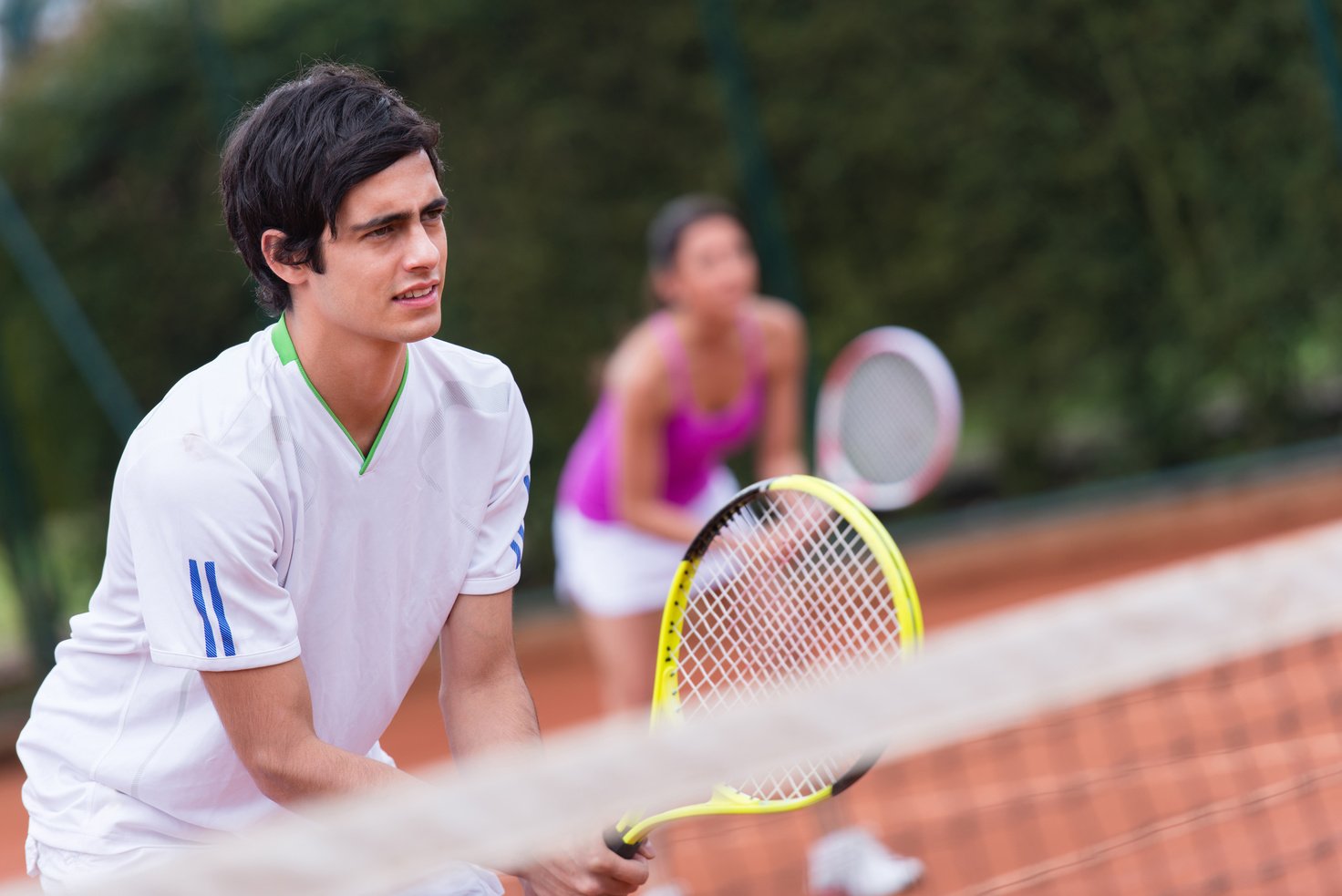 Tennis Players Playing Doubles